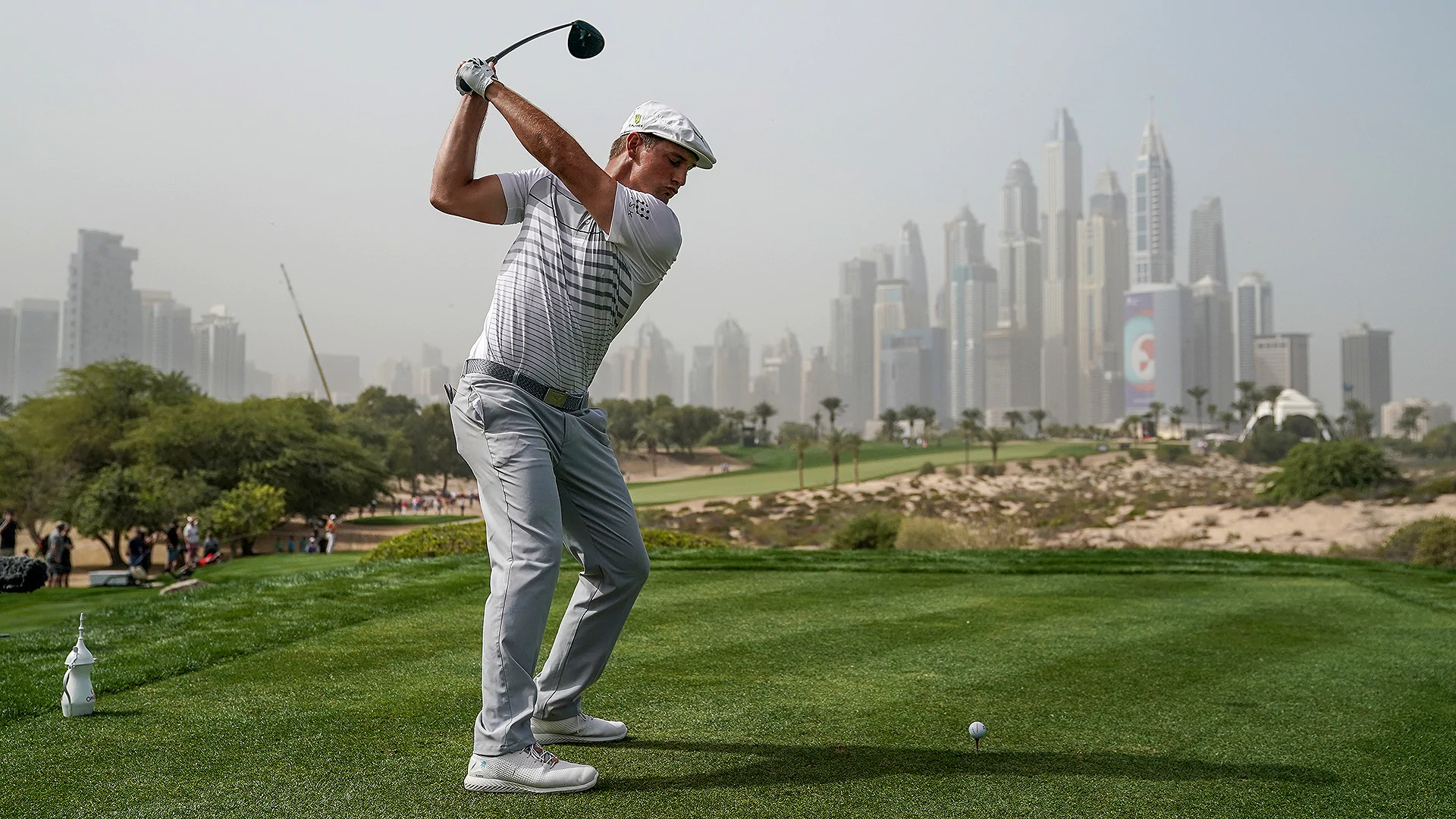 Eyeing international win, DeChambeau opens with 66 in Dubai