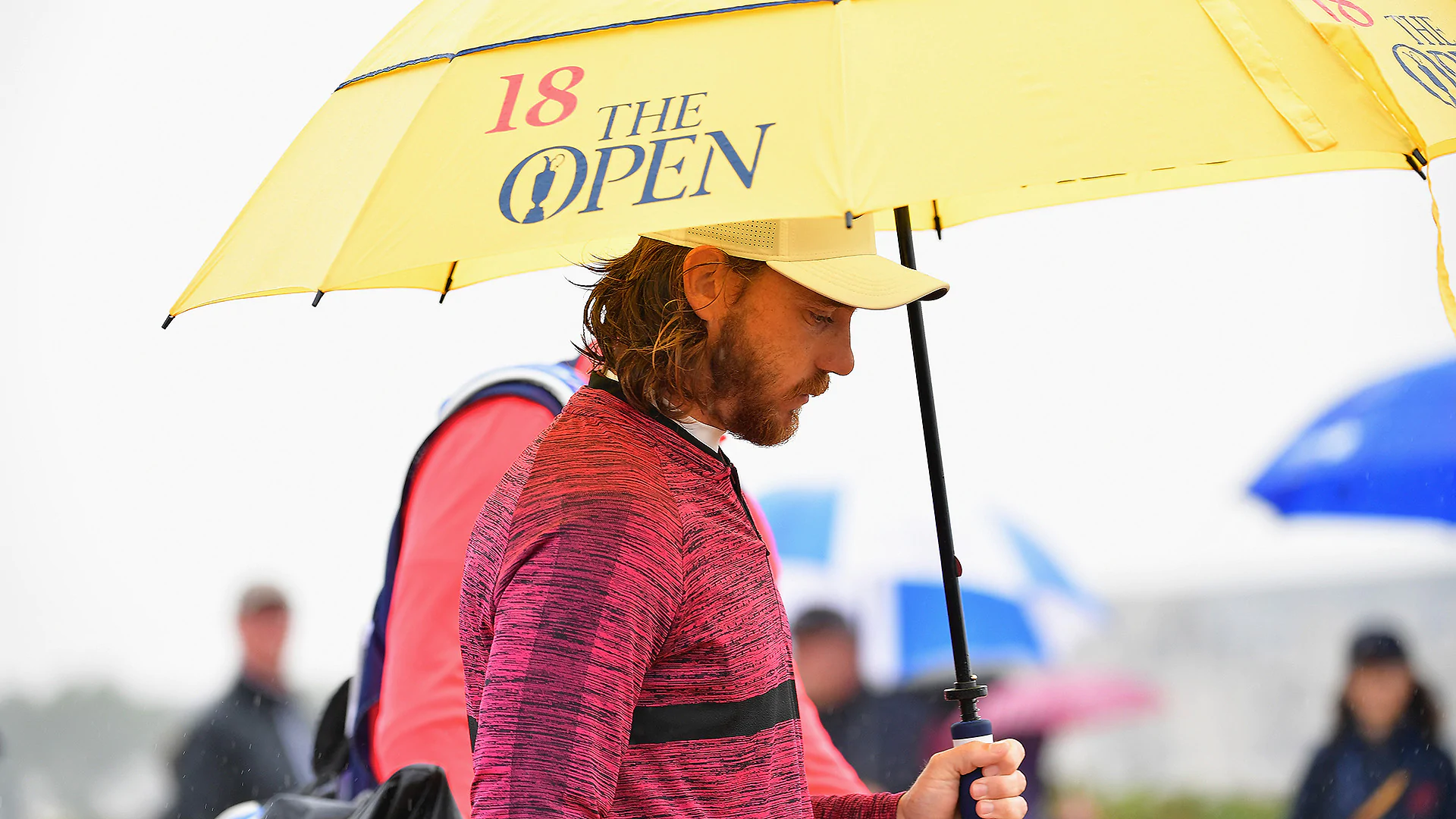 Fleetwood, with his fancy umbrella, fires 65 on Day 2