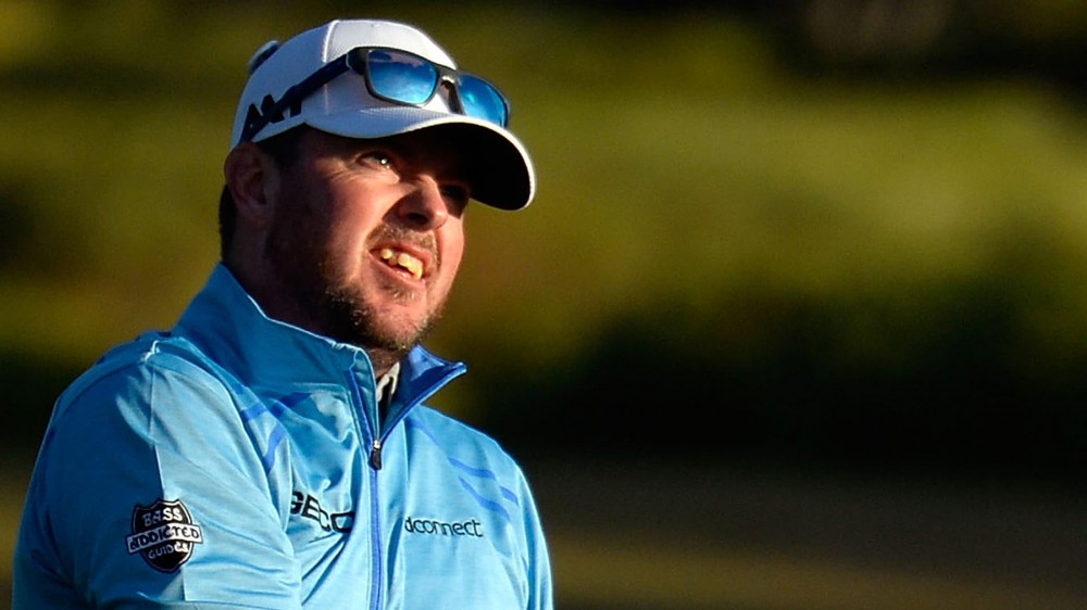 Garrigus (65) credits Couples for wind advice