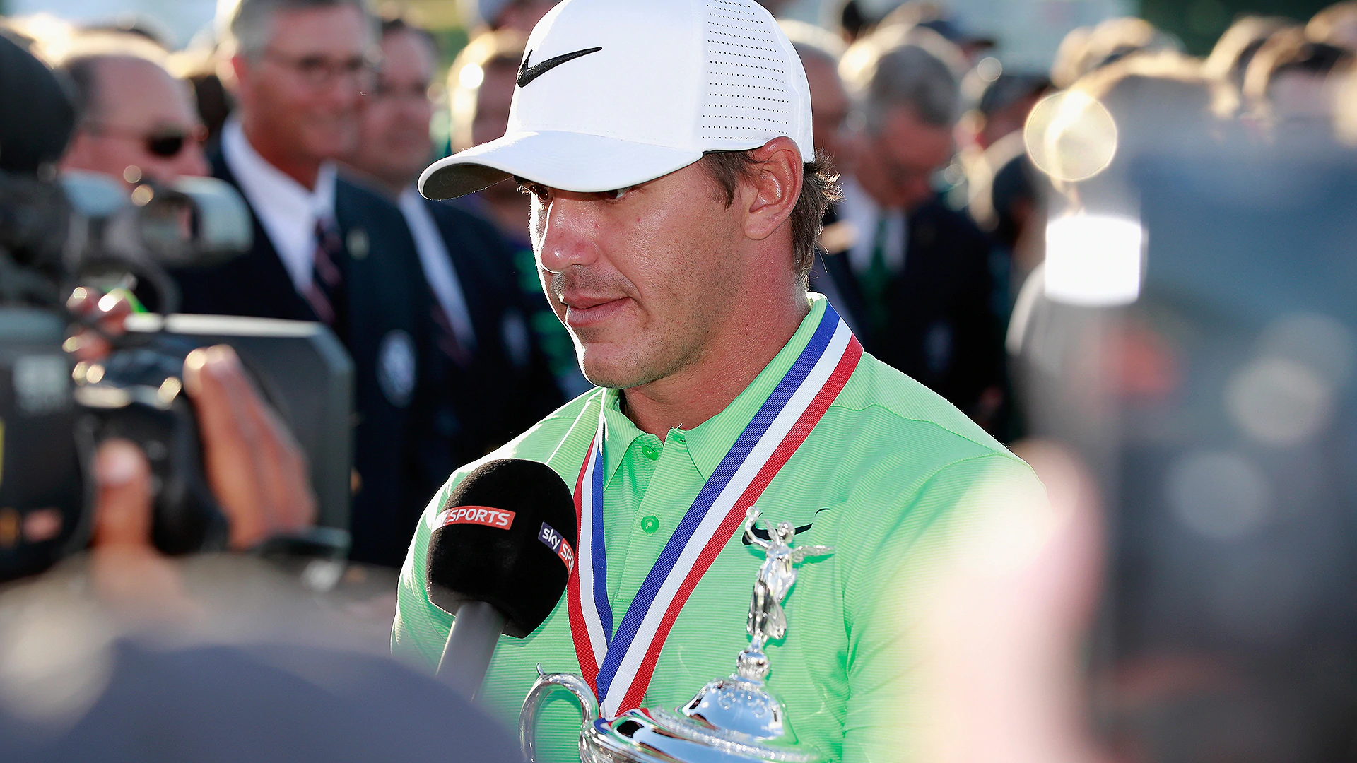 Koepka wins after 'long phone call' from DJ 5