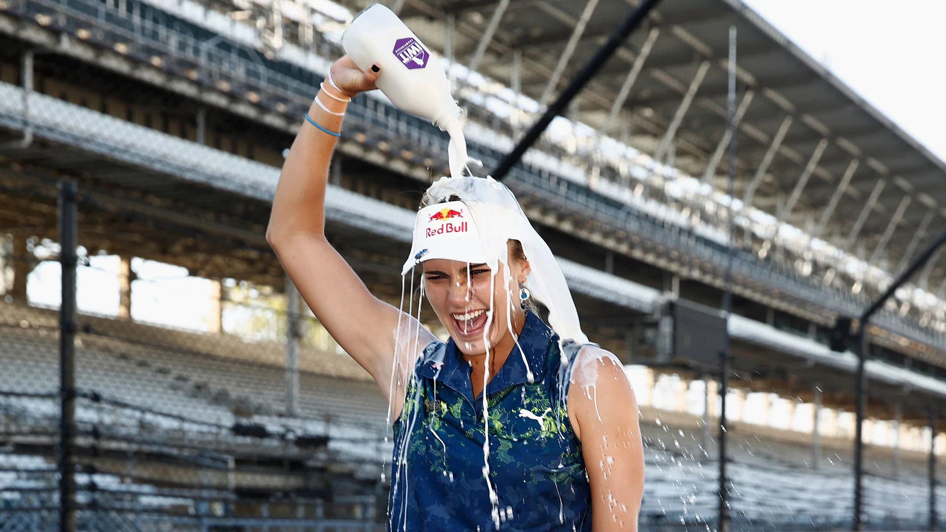 Lexi drinks milk, kisses bricks after Indy victory