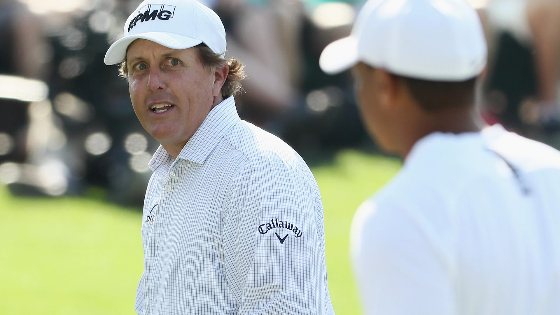 Mickelson wows Woods with holed flop shot