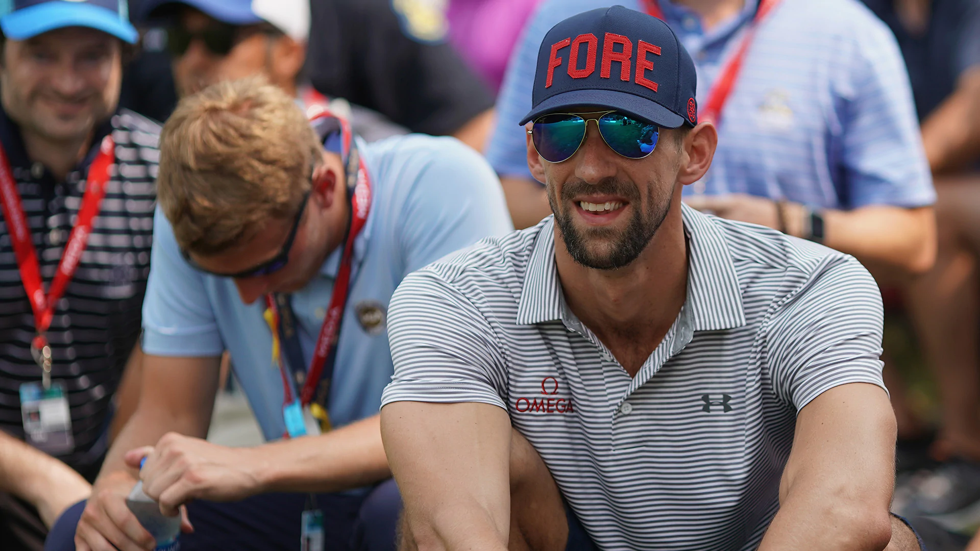 Phelps has front-row seat to Tiger at PGA