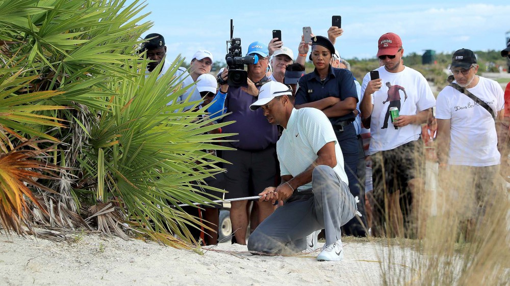 Replay rule benefits Tiger: No penalty for Woods after double-hit