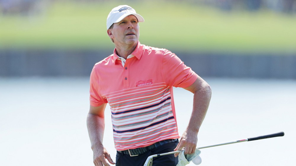 Stricker contending at Players, torn between tours