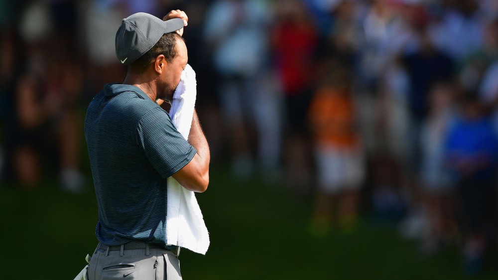 Tiger goes 3 under after changing sweaty shirt