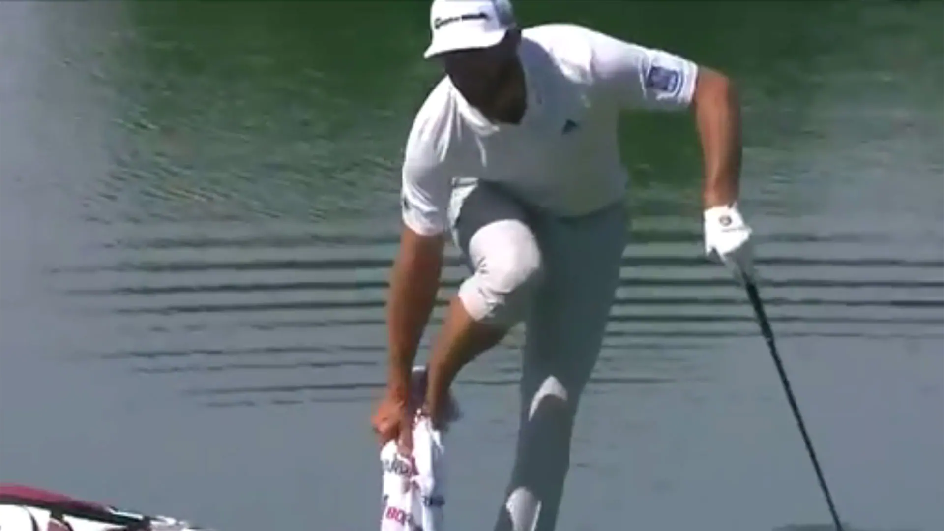 Watch: DJ takes off shoe, stands in water, chips in