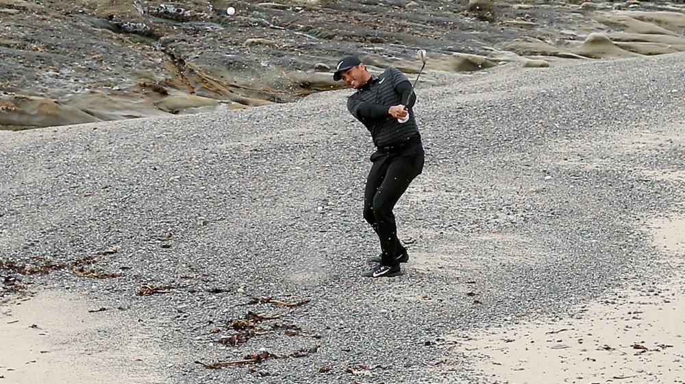 Watch: Day makes par from actual pebble beach at 18