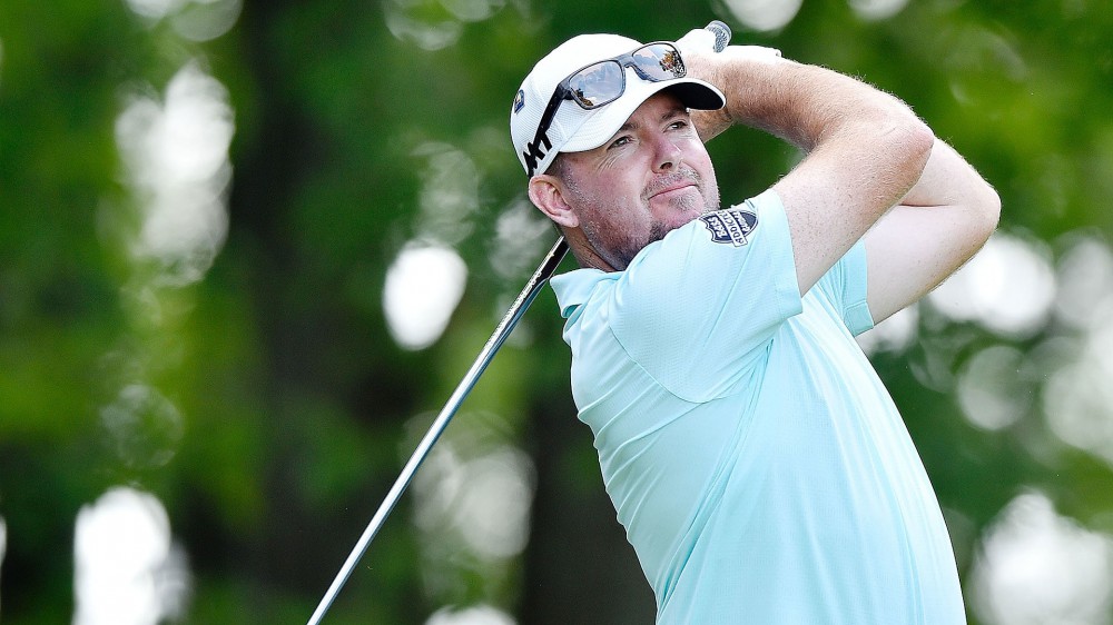 Watch: Garrigus' drive hits pin, doesn't drop for par-4 ace