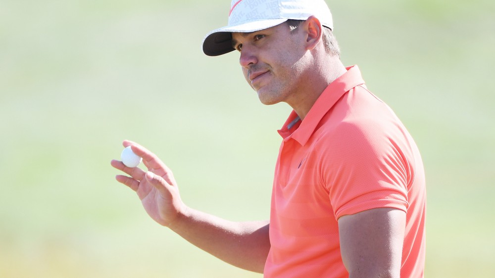 Watch: Koepka makes 61-footer for par at 14
