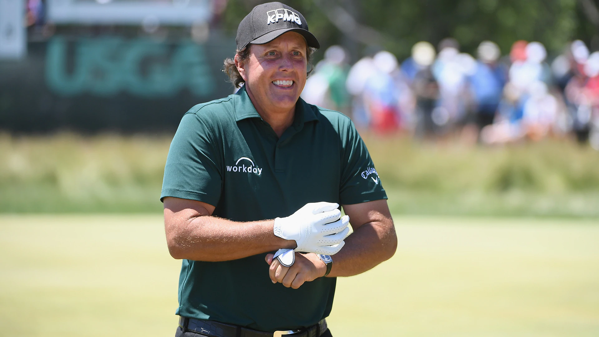 Watch: Phil takes 2-shot penalty for hitting moving ball