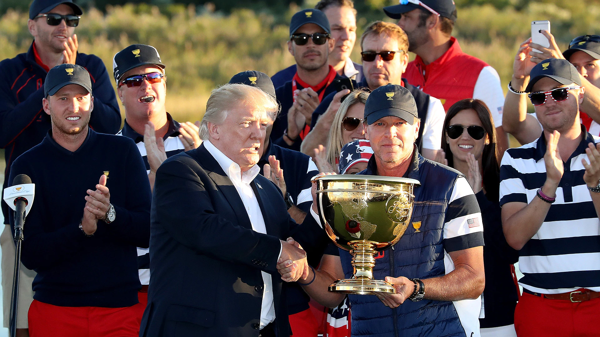 Watch: President Trump presents trophy to U.S. team