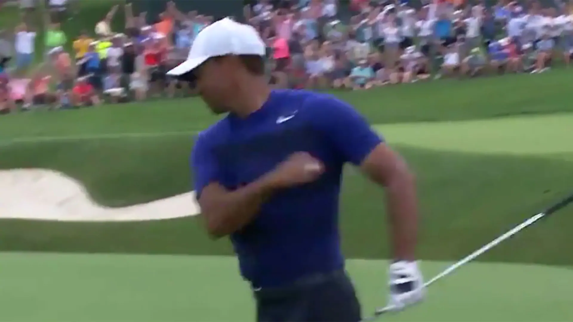 Watch: Tiger holes out for eagle at 11, hits flag at 12