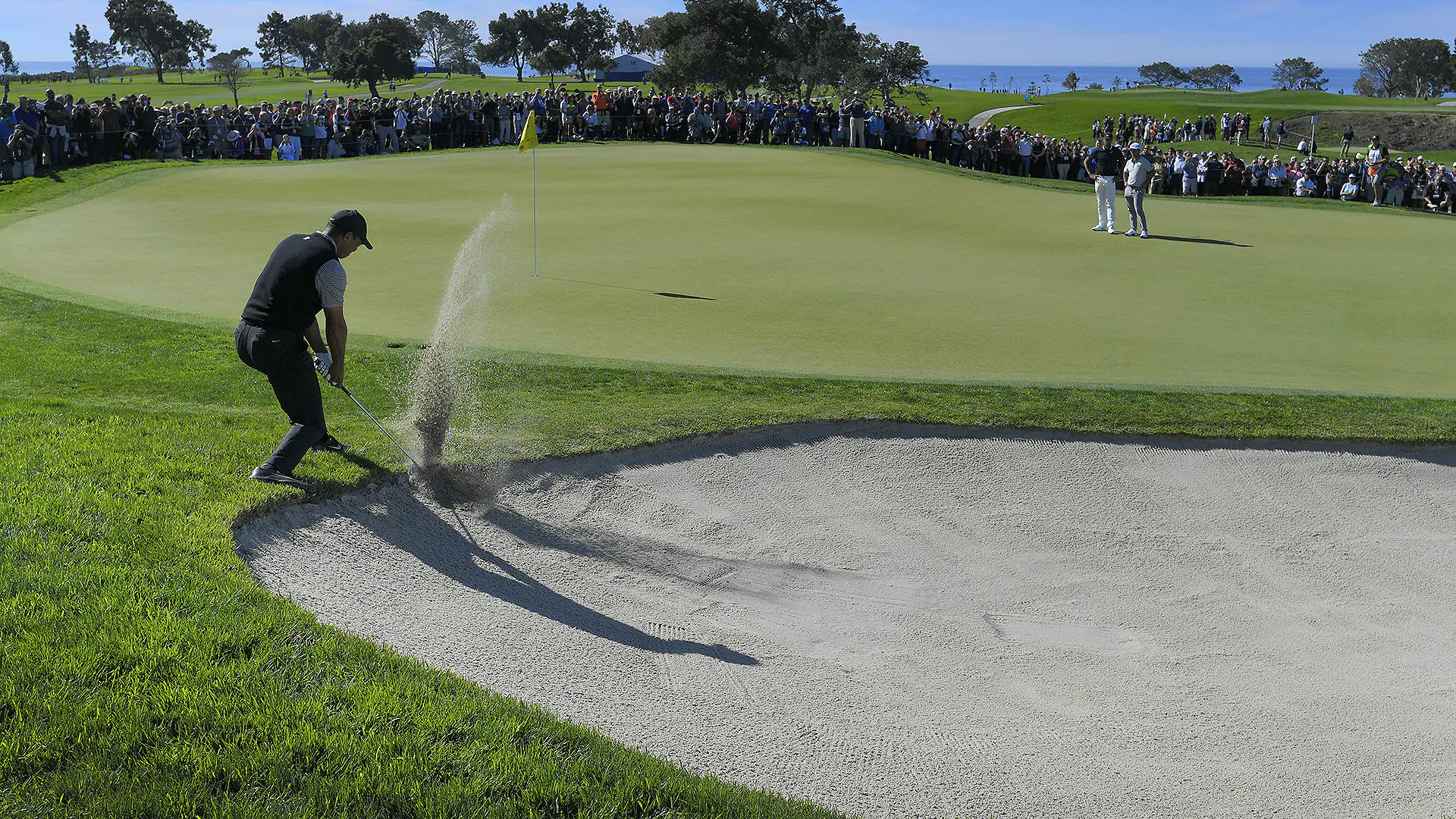 Watch: Tiger makes double after devilishly plugged lie in the bunker