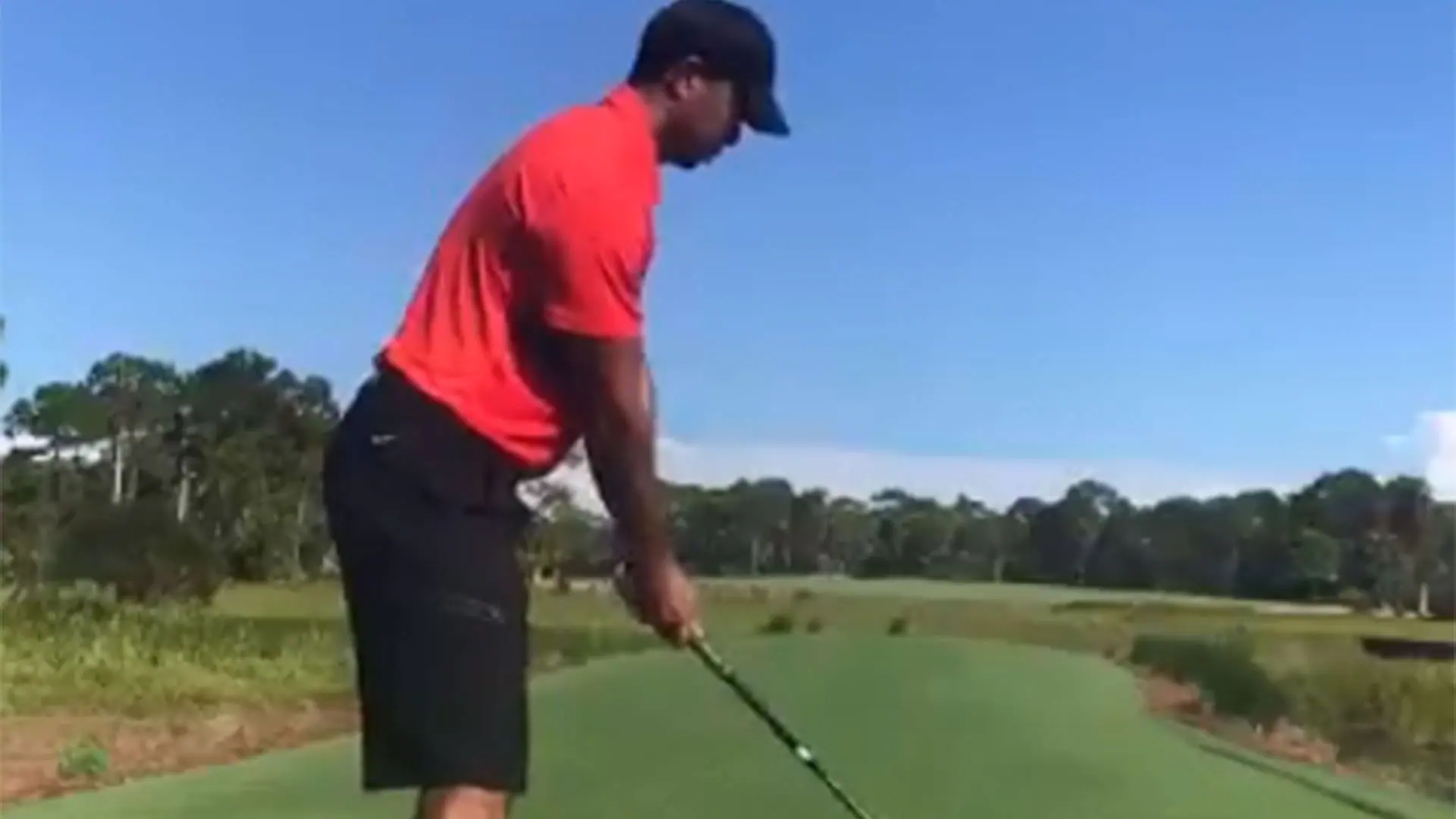 Watch: Tiger tees off with driver in Sunday red
