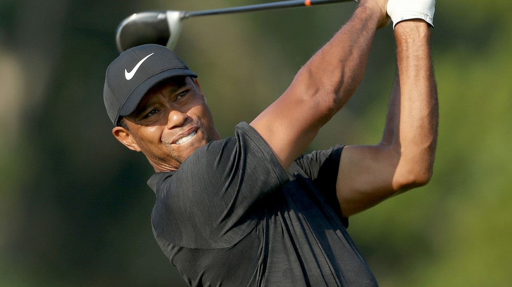 Woods (66) six back after 36 holes