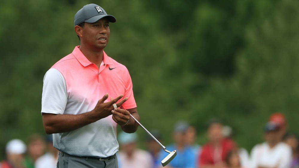 Woods (68) improves with 'old school' stroke
