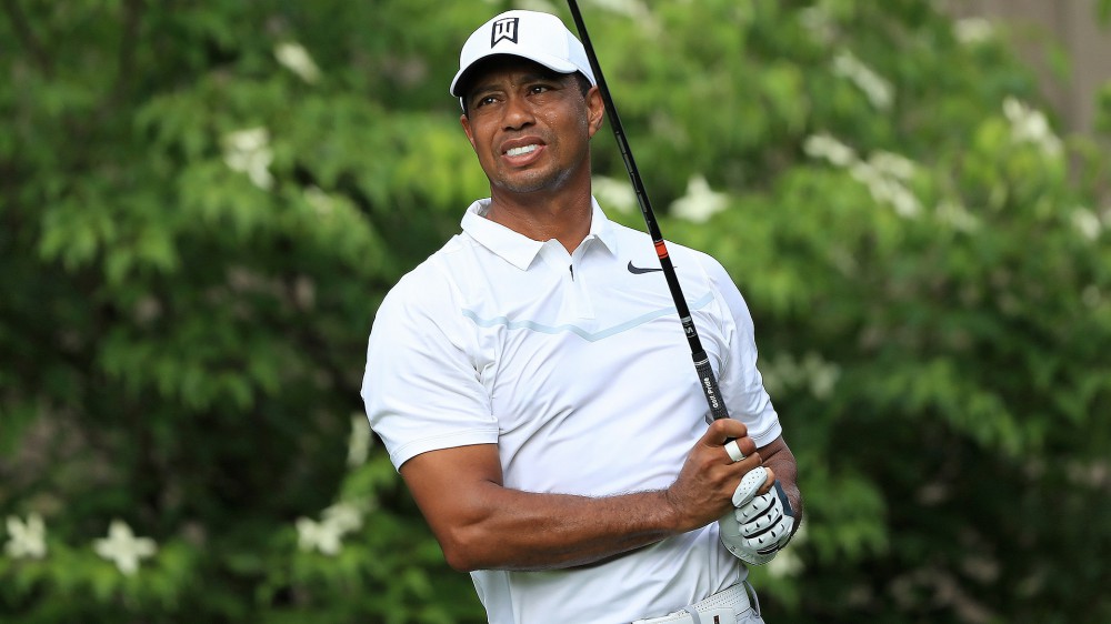 Woods (72): Back was tight, but no pain in Rd. 1