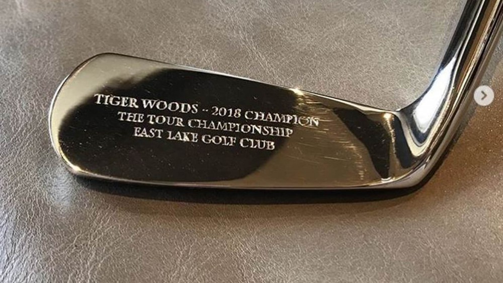Woods receives his Tour Championship trophy